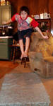 My nephew Michael trying to see how high he can jump.